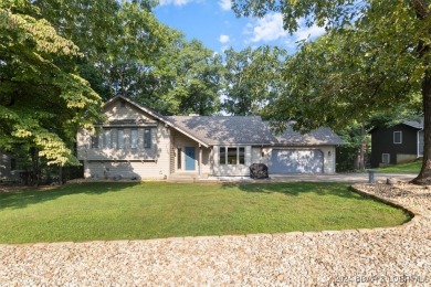 Come visit this beautiful home with a seasonal lake view in the on Bayview Golf Course in Missouri - for sale on GolfHomes.com, golf home, golf lot