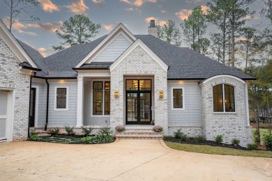 This meticulous custom golf residence is impeccably built with on Reynolds Lake Oconee - The Oconee in Georgia - for sale on GolfHomes.com, golf home, golf lot