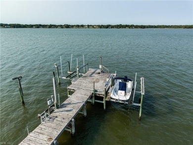Perfectly Positioned on the pinnacle of a beautiful bluff on The Tradition Golf Club At Broad Bay in Virginia - for sale on GolfHomes.com, golf home, golf lot