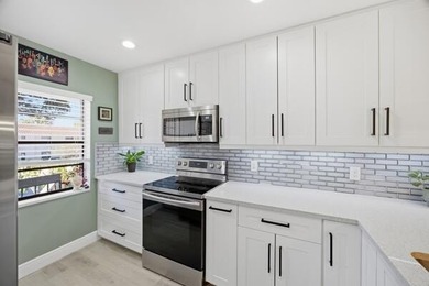 This beautifully updated 2-bedroom, 2-bath residence offers on Boca Lago Golf and Country Club in Florida - for sale on GolfHomes.com, golf home, golf lot