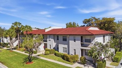 This beautifully updated 2-bedroom, 2-bath residence offers on Boca Lago Golf and Country Club in Florida - for sale on GolfHomes.com, golf home, golf lot