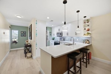 This beautifully updated 2-bedroom, 2-bath residence offers on Boca Lago Golf and Country Club in Florida - for sale on GolfHomes.com, golf home, golf lot