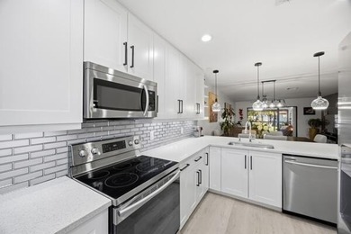 This beautifully updated 2-bedroom, 2-bath residence offers on Boca Lago Golf and Country Club in Florida - for sale on GolfHomes.com, golf home, golf lot