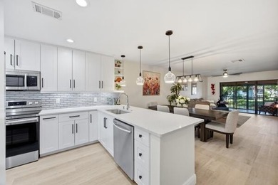 This beautifully updated 2-bedroom, 2-bath residence offers on Boca Lago Golf and Country Club in Florida - for sale on GolfHomes.com, golf home, golf lot