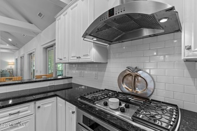 Tucked within the maritime forest and overlooking the 15th on Bald Head Island Golf Club in North Carolina - for sale on GolfHomes.com, golf home, golf lot