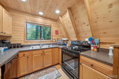 Welcome to 1746 Sonnenblick Drive -- a stunning chalet retreat on Innsbrook Resort Golf Course in Missouri - for sale on GolfHomes.com, golf home, golf lot
