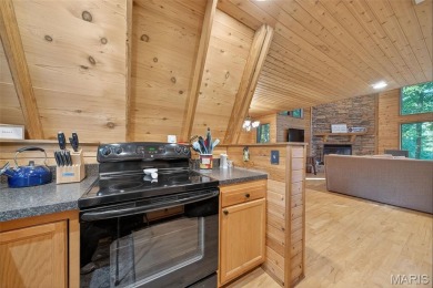 Welcome to 1746 Sonnenblick Drive -- a stunning chalet retreat on Innsbrook Resort Golf Course in Missouri - for sale on GolfHomes.com, golf home, golf lot