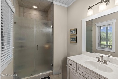 Tucked within the maritime forest and overlooking the 15th on Bald Head Island Golf Club in North Carolina - for sale on GolfHomes.com, golf home, golf lot