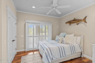 Tucked within the maritime forest and overlooking the 15th on Bald Head Island Golf Club in North Carolina - for sale on GolfHomes.com, golf home, golf lot