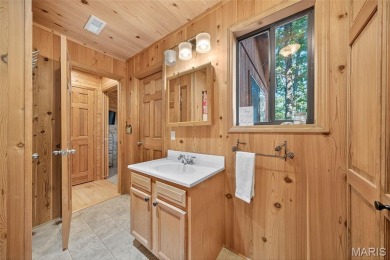 Welcome to 1746 Sonnenblick Drive -- a stunning chalet retreat on Innsbrook Resort Golf Course in Missouri - for sale on GolfHomes.com, golf home, golf lot