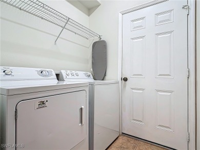 Welcome to this charming Solana home in the friendly HERONS GLEN on Herons Glen Golf and Country Club in Florida - for sale on GolfHomes.com, golf home, golf lot