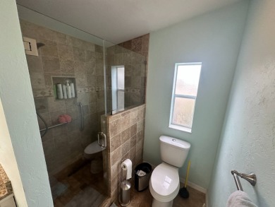 Beautiful stucco home on a quiet cul de sac. Tastefully updated on Del Tura Golf and Country Club in Florida - for sale on GolfHomes.com, golf home, golf lot