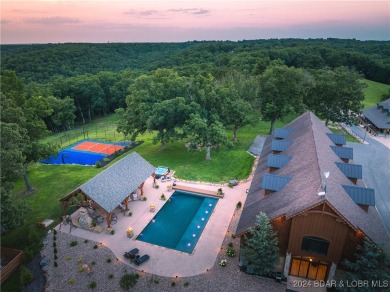 A 263-acre waterfront property with a three-slip dock, located on Bayview Golf Course in Missouri - for sale on GolfHomes.com, golf home, golf lot