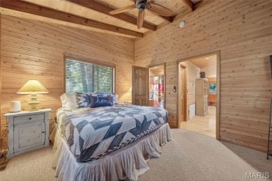 Welcome to 1746 Sonnenblick Drive -- a stunning chalet retreat on Innsbrook Resort Golf Course in Missouri - for sale on GolfHomes.com, golf home, golf lot