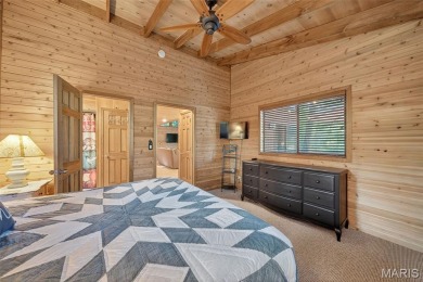 Welcome to 1746 Sonnenblick Drive -- a stunning chalet retreat on Innsbrook Resort Golf Course in Missouri - for sale on GolfHomes.com, golf home, golf lot