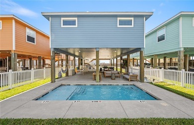 Welcome to this stunning 2021 built stilt style coastal retreat on Palmilla Beach Golf Club in Texas - for sale on GolfHomes.com, golf home, golf lot