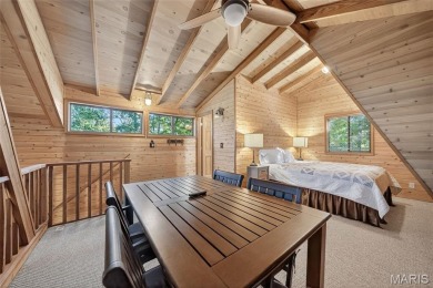Welcome to 1746 Sonnenblick Drive -- a stunning chalet retreat on Innsbrook Resort Golf Course in Missouri - for sale on GolfHomes.com, golf home, golf lot