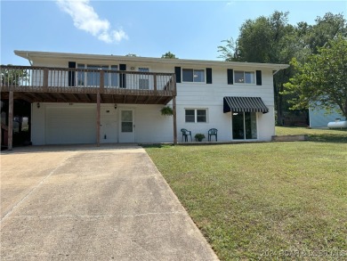 THE VIEWS!! THE SHORES!! SUNNY SLOPE CIRCLE IS THE PLACE TO 
 on Lake Valley Country Club in Missouri - for sale on GolfHomes.com, golf home, golf lot