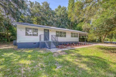 Charming and fully renovated... This cozy 3-bedroom, 1-bath home on Osceola Municipal Golf Course in Florida - for sale on GolfHomes.com, golf home, golf lot
