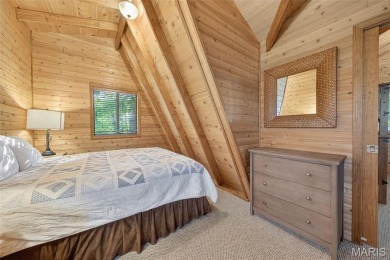 Welcome to 1746 Sonnenblick Drive -- a stunning chalet retreat on Innsbrook Resort Golf Course in Missouri - for sale on GolfHomes.com, golf home, golf lot