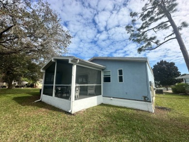 Beautiful stucco home on a quiet cul de sac. Tastefully updated on Del Tura Golf and Country Club in Florida - for sale on GolfHomes.com, golf home, golf lot