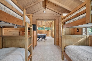 Welcome to 1746 Sonnenblick Drive -- a stunning chalet retreat on Innsbrook Resort Golf Course in Missouri - for sale on GolfHomes.com, golf home, golf lot