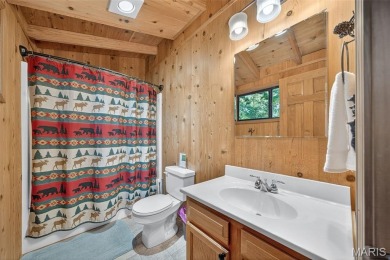 Welcome to 1746 Sonnenblick Drive -- a stunning chalet retreat on Innsbrook Resort Golf Course in Missouri - for sale on GolfHomes.com, golf home, golf lot