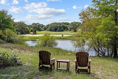 Tucked within the maritime forest and overlooking the 15th on Bald Head Island Golf Club in North Carolina - for sale on GolfHomes.com, golf home, golf lot
