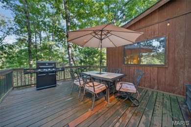 Welcome to 1746 Sonnenblick Drive -- a stunning chalet retreat on Innsbrook Resort Golf Course in Missouri - for sale on GolfHomes.com, golf home, golf lot