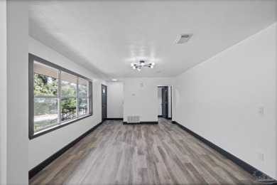 Charming and fully renovated... This cozy 3-bedroom, 1-bath home on Osceola Municipal Golf Course in Florida - for sale on GolfHomes.com, golf home, golf lot