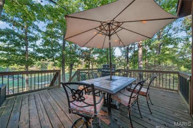 Welcome to 1746 Sonnenblick Drive -- a stunning chalet retreat on Innsbrook Resort Golf Course in Missouri - for sale on GolfHomes.com, golf home, golf lot