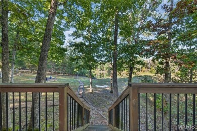 Welcome to 1746 Sonnenblick Drive -- a stunning chalet retreat on Innsbrook Resort Golf Course in Missouri - for sale on GolfHomes.com, golf home, golf lot