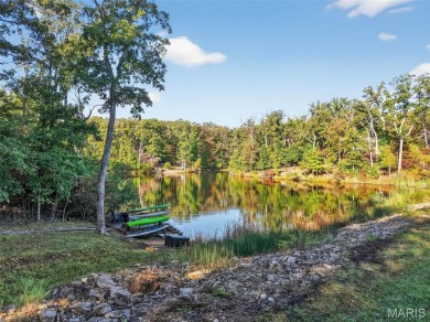 Welcome to 1746 Sonnenblick Drive -- a stunning chalet retreat on Innsbrook Resort Golf Course in Missouri - for sale on GolfHomes.com, golf home, golf lot
