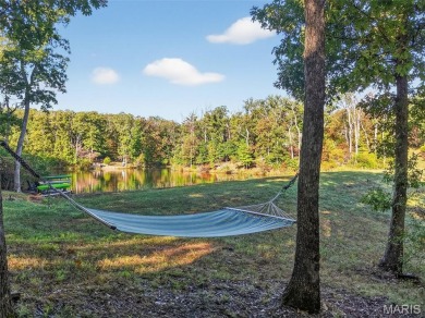 Welcome to 1746 Sonnenblick Drive -- a stunning chalet retreat on Innsbrook Resort Golf Course in Missouri - for sale on GolfHomes.com, golf home, golf lot