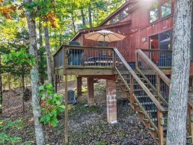 Welcome to 1746 Sonnenblick Drive -- a stunning chalet retreat on Innsbrook Resort Golf Course in Missouri - for sale on GolfHomes.com, golf home, golf lot