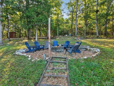 Welcome to 1746 Sonnenblick Drive -- a stunning chalet retreat on Innsbrook Resort Golf Course in Missouri - for sale on GolfHomes.com, golf home, golf lot
