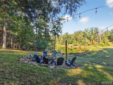 Welcome to 1746 Sonnenblick Drive -- a stunning chalet retreat on Innsbrook Resort Golf Course in Missouri - for sale on GolfHomes.com, golf home, golf lot