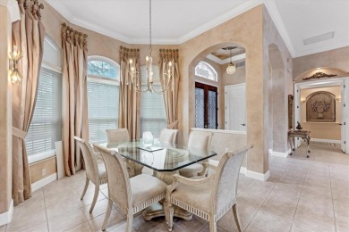 Updated roof, hurricane-impact windows and doors, new AC, water on University Park Country Club in Florida - for sale on GolfHomes.com, golf home, golf lot