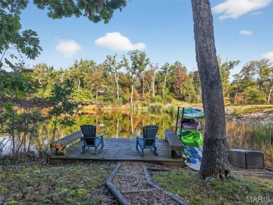 Welcome to 1746 Sonnenblick Drive -- a stunning chalet retreat on Innsbrook Resort Golf Course in Missouri - for sale on GolfHomes.com, golf home, golf lot