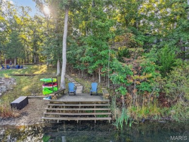 Welcome to 1746 Sonnenblick Drive -- a stunning chalet retreat on Innsbrook Resort Golf Course in Missouri - for sale on GolfHomes.com, golf home, golf lot