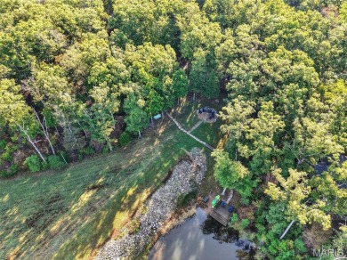 Welcome to 1746 Sonnenblick Drive -- a stunning chalet retreat on Innsbrook Resort Golf Course in Missouri - for sale on GolfHomes.com, golf home, golf lot