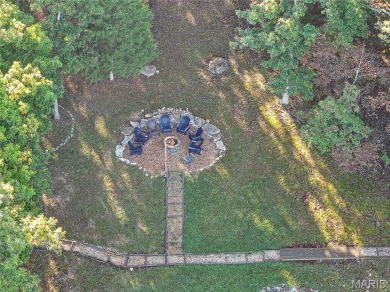 Welcome to 1746 Sonnenblick Drive -- a stunning chalet retreat on Innsbrook Resort Golf Course in Missouri - for sale on GolfHomes.com, golf home, golf lot