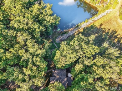 Welcome to 1746 Sonnenblick Drive -- a stunning chalet retreat on Innsbrook Resort Golf Course in Missouri - for sale on GolfHomes.com, golf home, golf lot