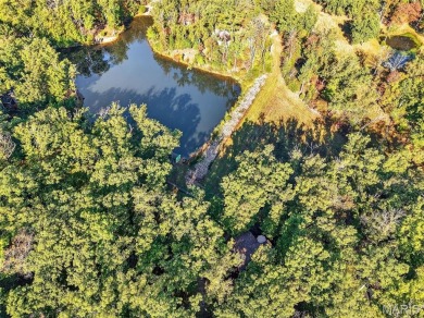 Welcome to 1746 Sonnenblick Drive -- a stunning chalet retreat on Innsbrook Resort Golf Course in Missouri - for sale on GolfHomes.com, golf home, golf lot