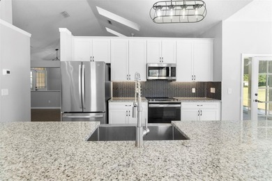 Here's a magnificently restored home in the beautiful, mature on Errol Estates Country Club in Florida - for sale on GolfHomes.com, golf home, golf lot