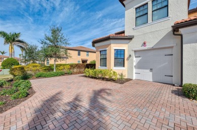 This stunning, rarely available, first level end-unit Bella Casa on Sarasota National Golf Club in Florida - for sale on GolfHomes.com, golf home, golf lot