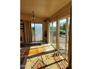 This beautiful Mountain Cabin in White Mountain Lakes has much on Silver Creek Golf Club in Arizona - for sale on GolfHomes.com, golf home, golf lot