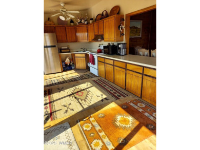 This beautiful Mountain Cabin in White Mountain Lakes has much on Silver Creek Golf Club in Arizona - for sale on GolfHomes.com, golf home, golf lot