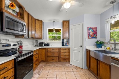 Secluded 3 bedroom 2 bath home surrounded on all 4 sides by on Holly Lake Ranch Golf Club in Texas - for sale on GolfHomes.com, golf home, golf lot