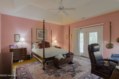 Nestled in a prestigious gated golf community, this brick home on Brunswick Plantation and Golf Resorts in North Carolina - for sale on GolfHomes.com, golf home, golf lot